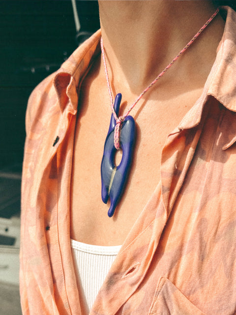 necklace with glass pendant dark blue